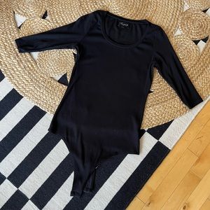 Black fine ribbed scoop neck bodysuit Fauxgerty. It is sized XL, fits smaller.